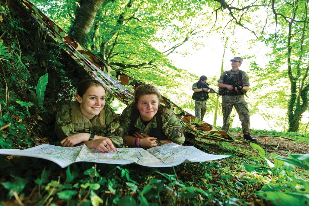 Four military students in outdoor practice